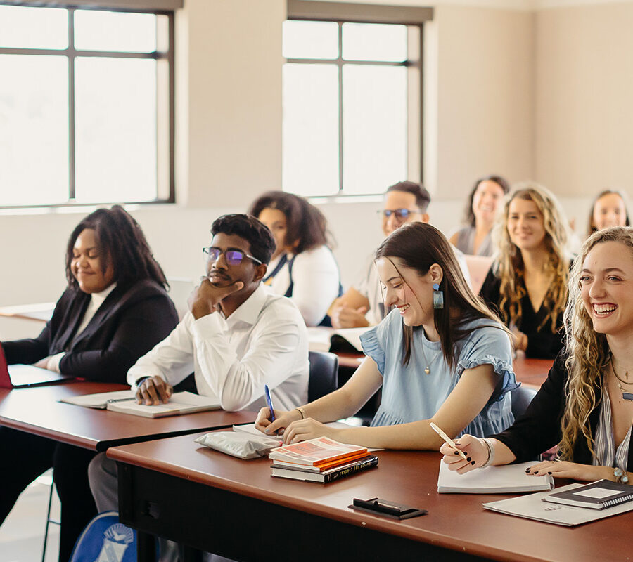 PBA students attend a classroom lecture.