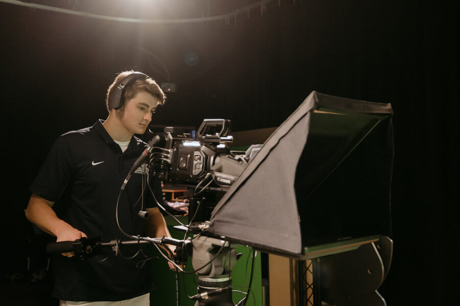 a PBA student uses a video camera