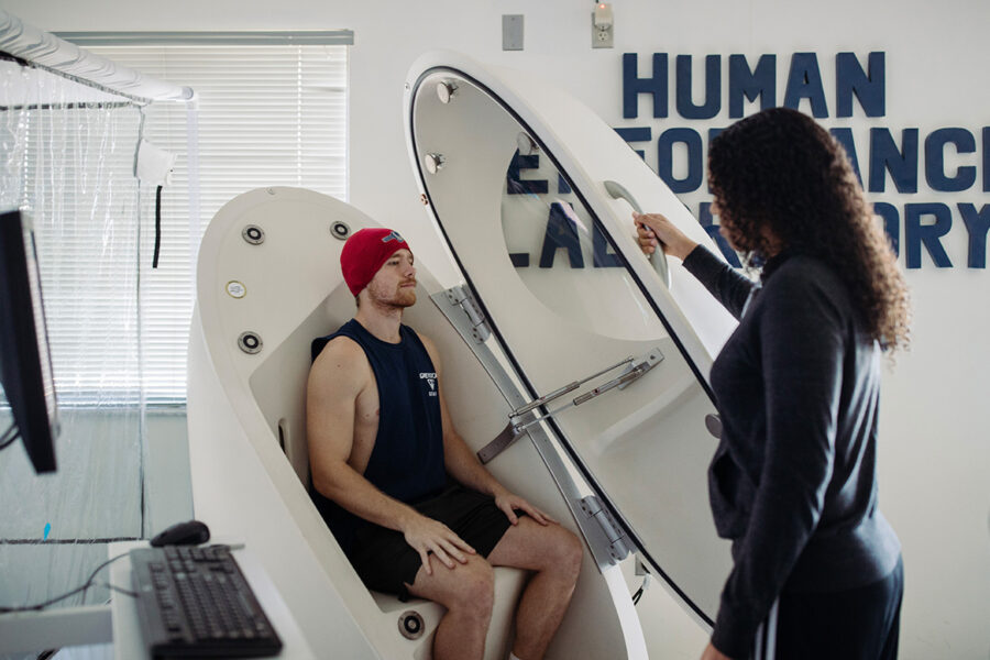 Exercise science student conducts a laboratory test.