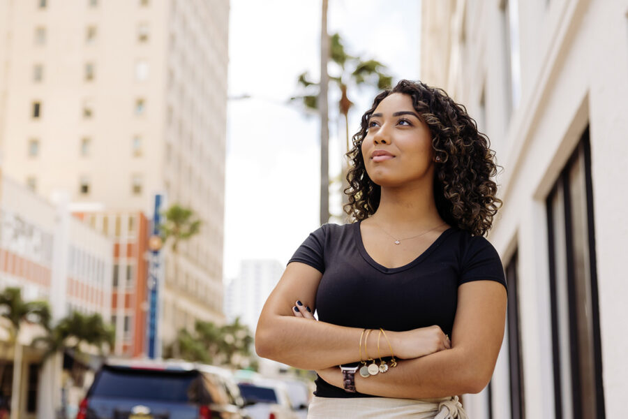 Student from Master of Accountancy 3+2 program stands outside in West Palm Beach.