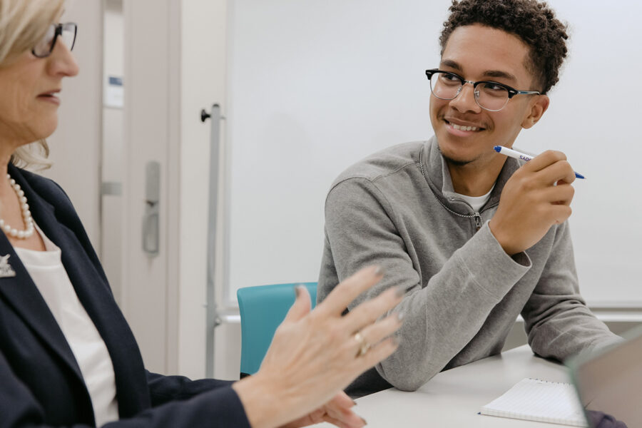 Mathematics student engages in classroom discussion.