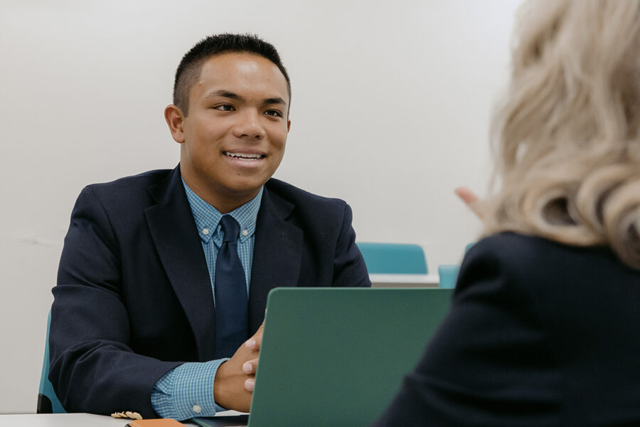 pre-law student engages in classroom discussion.