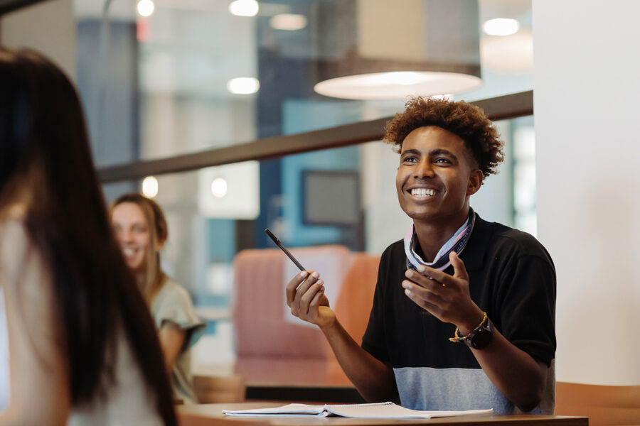 Education student engages in classroom discussion.