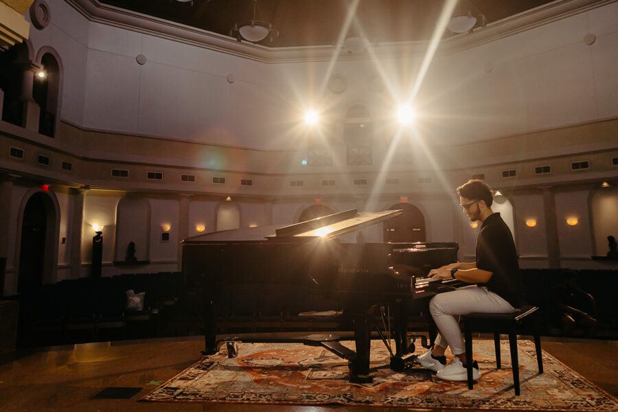 a student from the major in instrument performance playing the piano