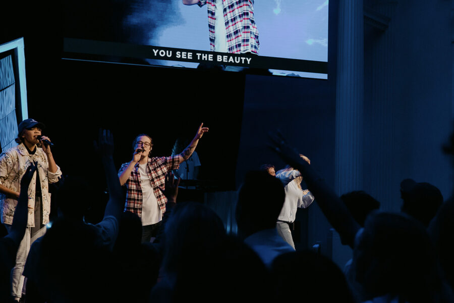 students from the worship leadership program sing on stage