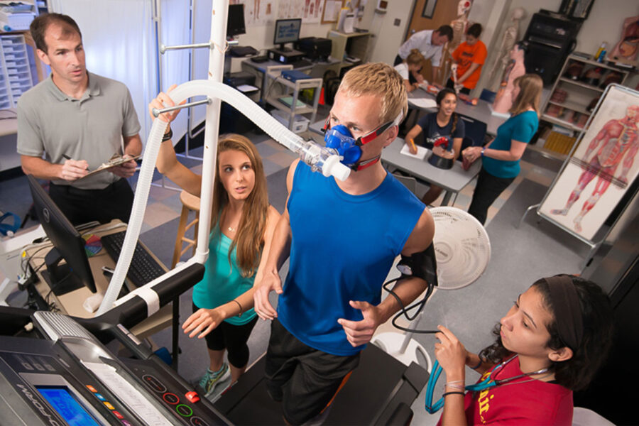 Students from the exercise science program gather data in a lab session.