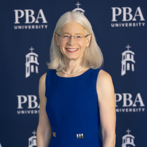 Debra Schwinn in a blue dress