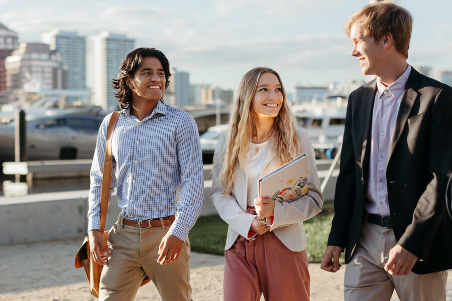 Three PBA students walk near the intercoastal waterway in West Palm Beach.