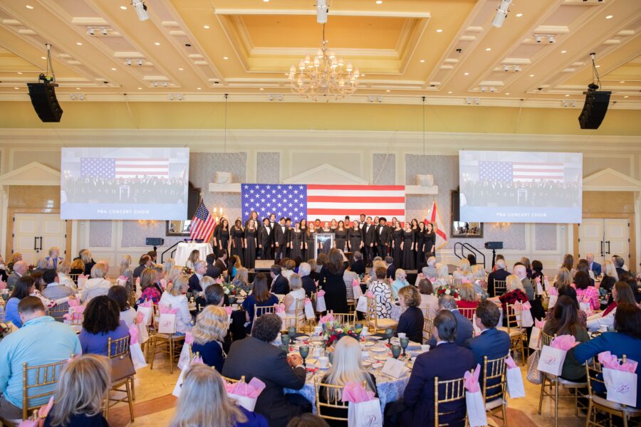 2025 Women of Distinction recipients on stage