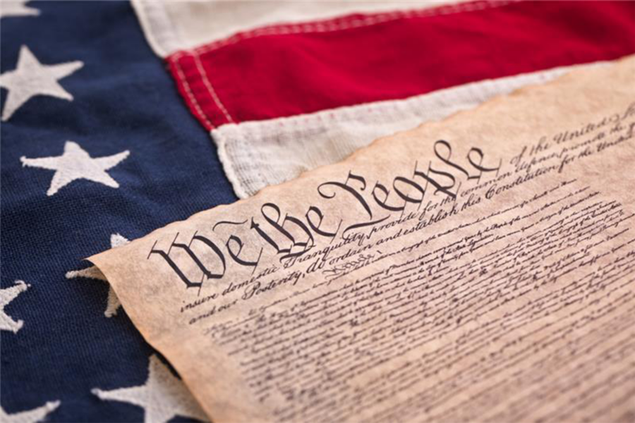 The U.S. Constitution is displayed on the nation's flag.