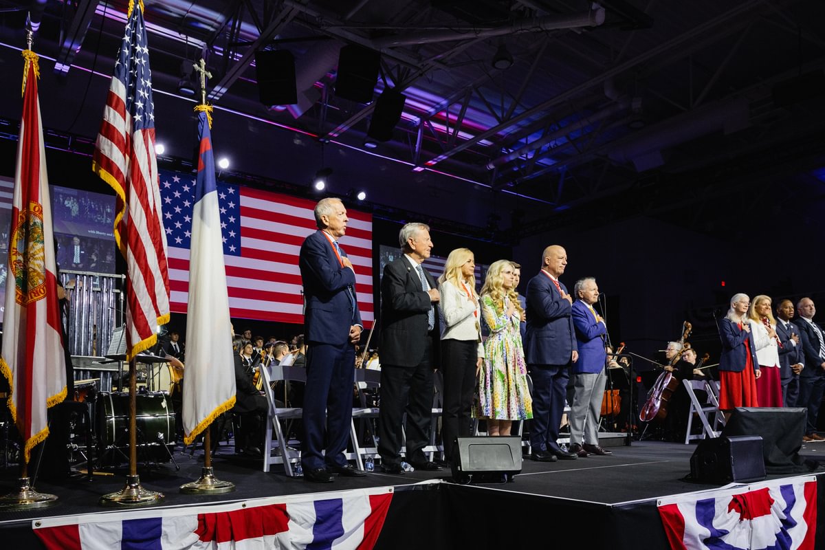American Free Enterprise medalists pledge allegiance to the nation's flag at Palm Beach Atlantic University's 41st annual event.