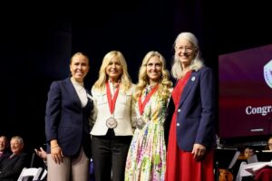 Sarah Wetenhall (second from right) receives the companion American Free Enterprise medal at Palm Beach Atlantic University.