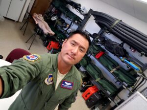 Luis Benitez in a room of medical supplies.