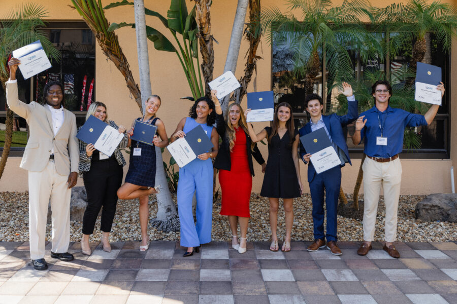 Palm Beach Atlantic University students celebrate receiving generous scholarships from the Titus Center for Franchising.