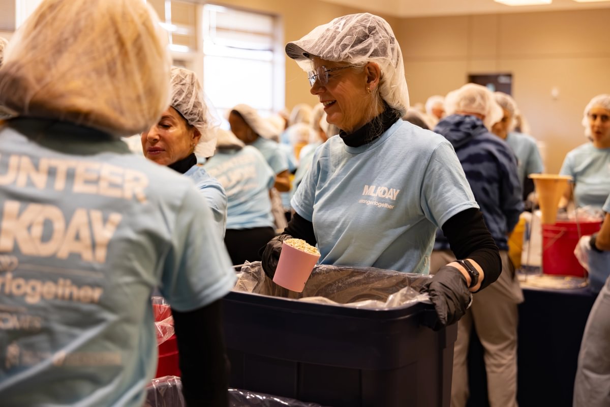 MLK Day of Service volunteers pack meals at Meals of Hope.
