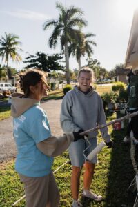 MLK Day of Service volunteers paint a local home.