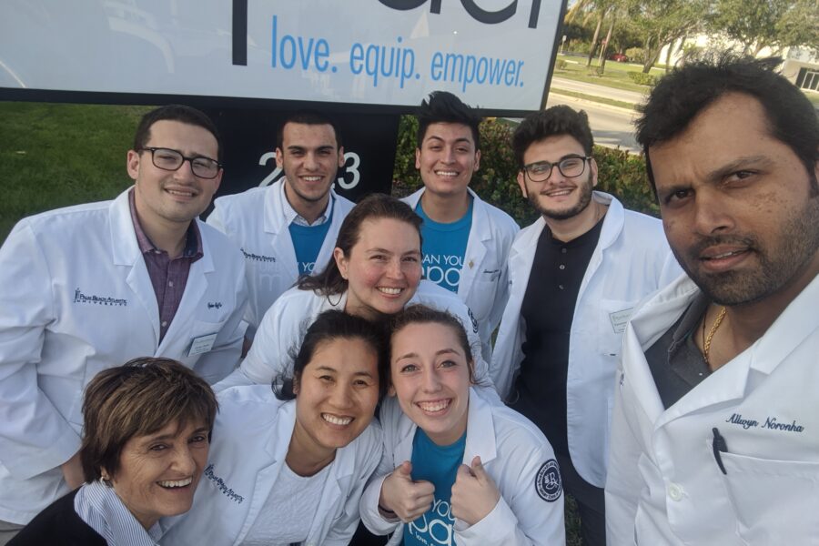 Dr. Barbara Kelly with her former students.