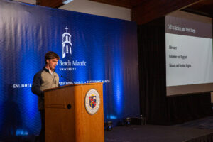 student speaks at interdisciplinary conference