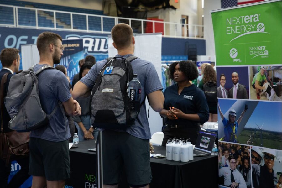 NextEra Energy representative speaks with Palm Beach Atlantic University students.