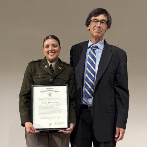 Palm Beach Atlantic University and ROTC program graduate Ashley Arango poses with a mentor.