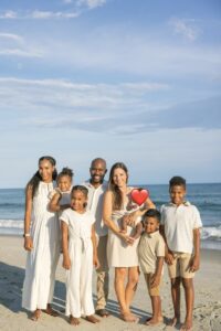Palm Beach Atlantic University Assistant Dean for Student Affairs and Associate Professor of Pharmacy Practice Dr. Jay Jackson on the beach with his family.
