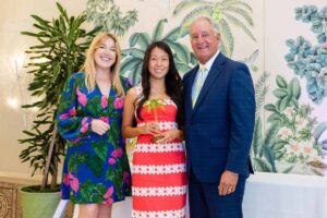 Palm Beach Atlantic University business student Rachel Paik (center) receives Student Volunteer Award at Palm Beach Chamber of Commerce Award Luncheon. Photo credit: @capehartphotography