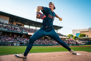 Daniel Foster Pitches in the Banana Ball League for Indiana team in stadium.