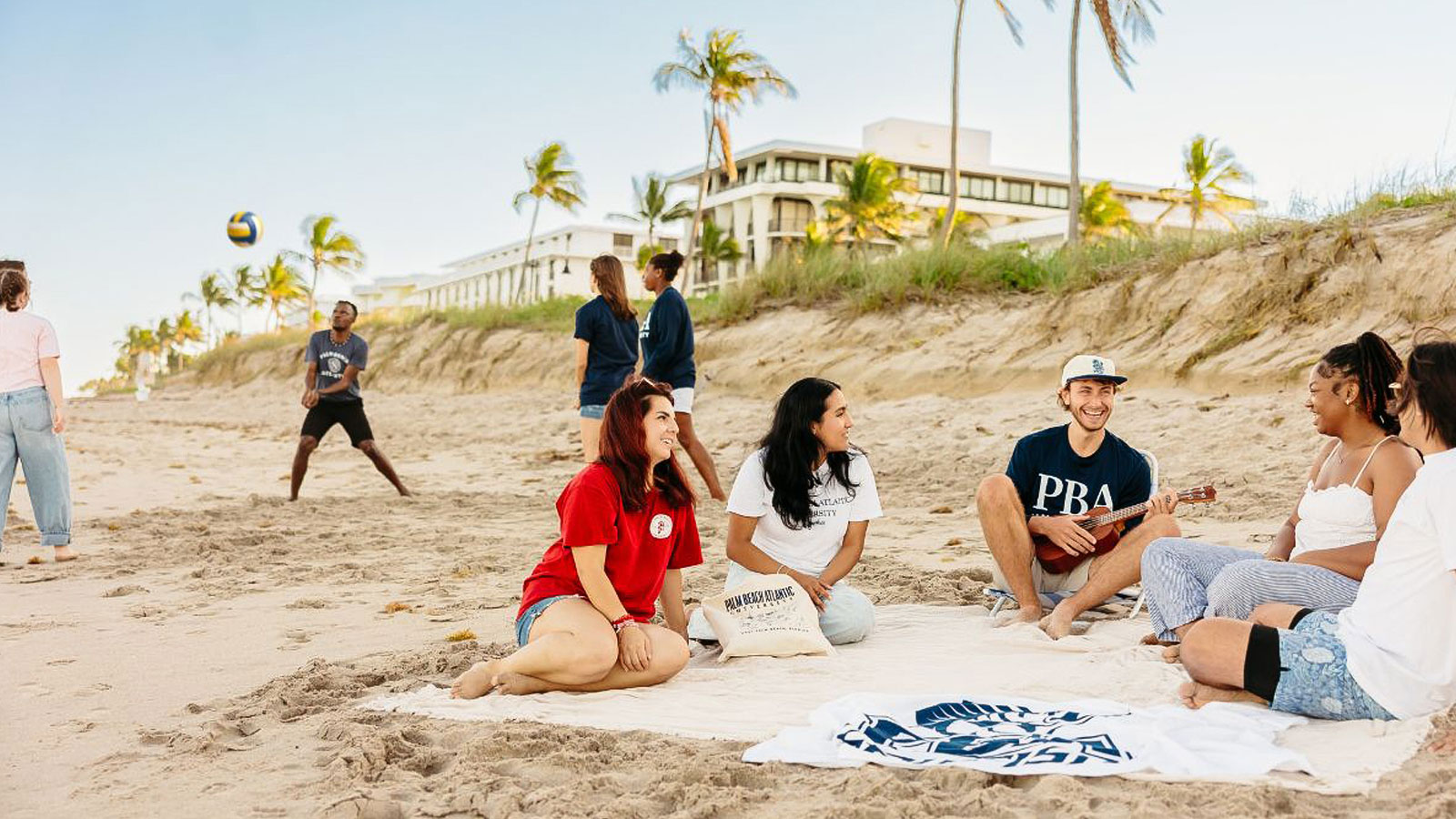 Students hanging out at the beach