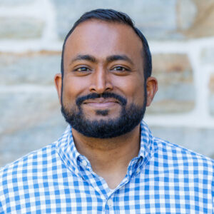 Ajay Thomas headshot